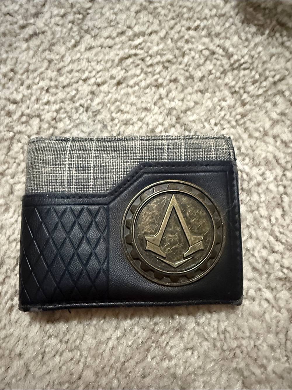 Men's Black and Gray Bifold Wallet with Brass Emblem